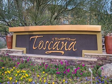 Toscana Condo Rentals sign